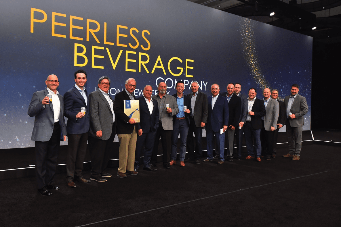 Peerless Beverage Company accepts the Gold Standard Award